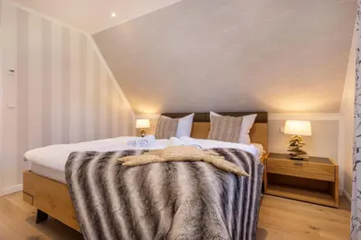 Ein Bett oder Betten in einem Zimmer der Unterkunft Ferienhaus Strandkajüte
