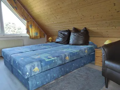 Ein Bett oder Betten in einem Zimmer der Unterkunft FeWo in Barth 