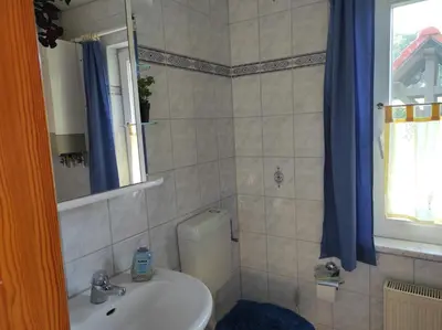 Ein Badezimmer in der Unterkunft FeWo in Barth 