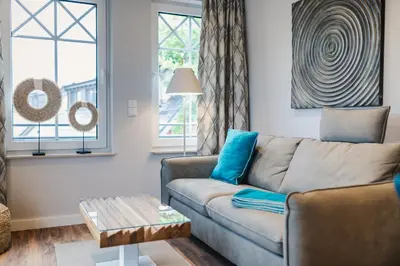 Ein Sitzbereich in der Unterkunft Ferienwohnung Auszeit