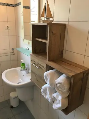 Ein Badezimmer in der Unterkunft Kompassrose