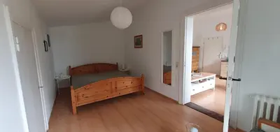 Ein Bett oder Betten in einem Zimmer der Unterkunft De lütt Stuuv