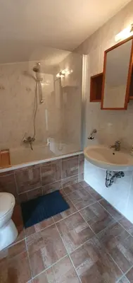 Ein Badezimmer in der Unterkunft De lütt Stuuv