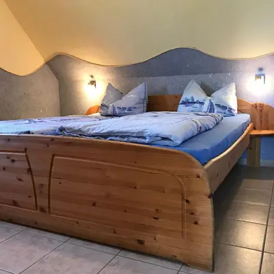 Ein Bett oder Betten in einem Zimmer der Unterkunft Sonnenwind