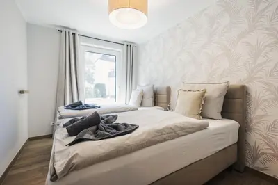 Ein Bett oder Betten in einem Zimmer der Unterkunft Ferienwohnung #einzigartig