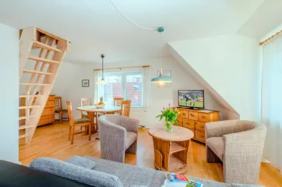 Ein Sitzbereich in der Unterkunft Ferienhaus Sanddorn, Fewo Stranddistel