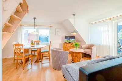 Ein Sitzbereich in der Unterkunft Ferienhaus Sanddorn, Fewo Stranddistel