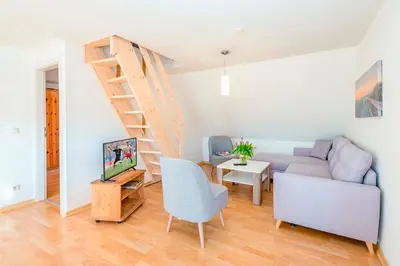 Ein Sitzbereich in der Unterkunft Ferienhaus Sanddorn, Fewo Strandaster