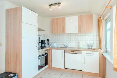 Küche/Küchenzeile in der Unterkunft Ferienhaus Sanddorn, Fewo Strandaster