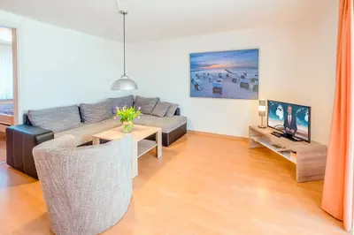 Ein Sitzbereich in der Unterkunft Ferienhaus Sanddorn, Fewo Sanddorn