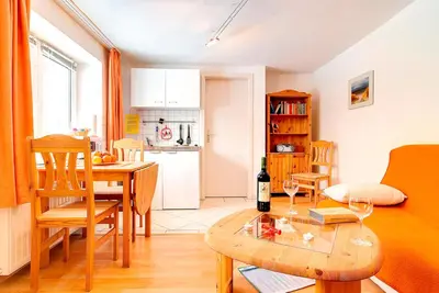 Ein Sitzbereich in der Unterkunft Ferienhaus Sanddorn, Fewo Seetang