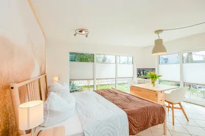 Ein Bett oder Betten in einem Zimmer der Unterkunft Ferienhaus Sanddorn, Studio
