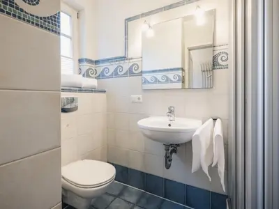 Ein Badezimmer in der Unterkunft Herzmuschel - b66393