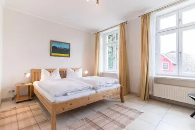 Ein Bett oder Betten in einem Zimmer der Unterkunft Ferienwohnung KRISTINA