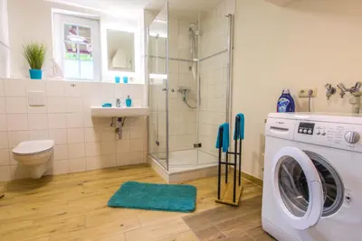 Ein Badezimmer in der Unterkunft Ferienwohnung im Landmannsheim