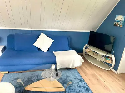 Ein Sitzbereich in der Unterkunft Apartment Fuhlendorf 1