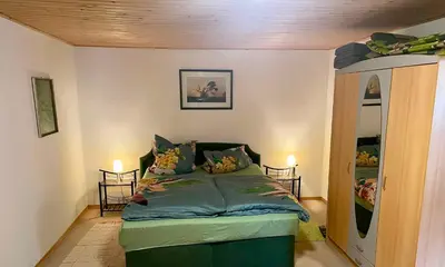 Ein Bett oder Betten in einem Zimmer der Unterkunft Apartment Fuhlendorf 2