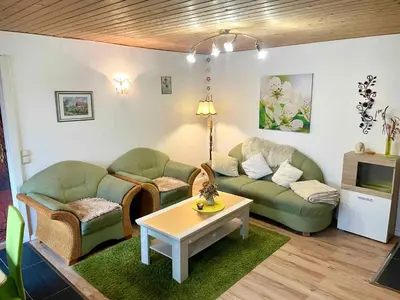 Ein Sitzbereich in der Unterkunft Apartment Fuhlendorf 2