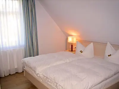 Ein Bett oder Betten in einem Zimmer der Unterkunft Holiday home in Prerow (Ostseebad) 2650