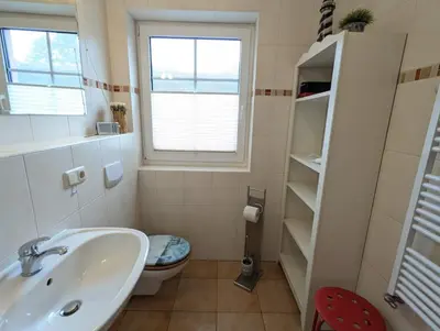 Ein Badezimmer in der Unterkunft Ferienwohnung Up Reede