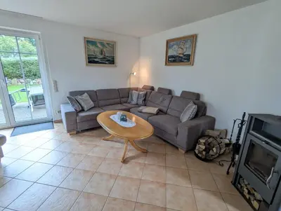 Ein Sitzbereich in der Unterkunft Ferienwohnung Up Reede