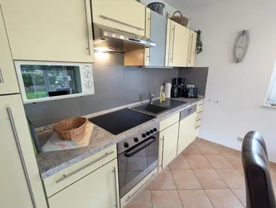 Küche/Küchenzeile in der Unterkunft Ferienwohnung Up Reede