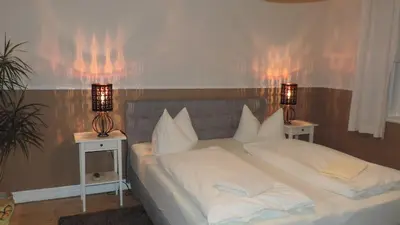 Ein Bett oder Betten in einem Zimmer der Unterkunft Haus Sonneneck 1 - b65940