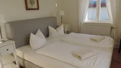 Ein Bett oder Betten in einem Zimmer der Unterkunft Haus Sonneneck 3 - b65942
