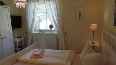 Ein Bett oder Betten in einem Zimmer der Unterkunft Akazienhaus 3 - b65935
