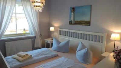 Ein Bett oder Betten in einem Zimmer der Unterkunft Akazienhaus 3 - b65935