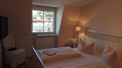 Ein Bett oder Betten in einem Zimmer der Unterkunft Akazienhaus 5 - b65936
