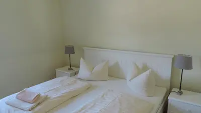 Ein Bett oder Betten in einem Zimmer der Unterkunft Akazienhaus 6 - b65939