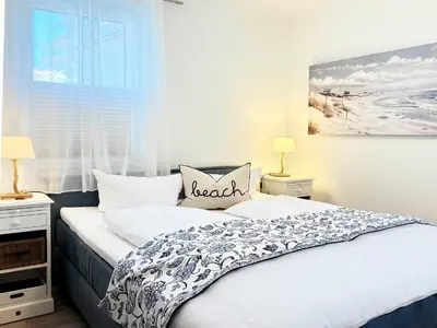 Ein Bett oder Betten in einem Zimmer der Unterkunft Störtebekerkoje 12 1