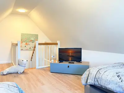 Ein Bett oder Betten in einem Zimmer der Unterkunft Störtebekerkoje 12 4