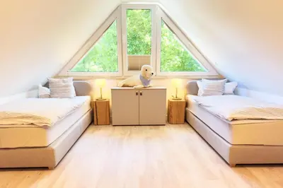 Ein Bett oder Betten in einem Zimmer der Unterkunft Störtebekerkoje 12a 4