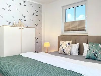 Ein Bett oder Betten in einem Zimmer der Unterkunft Störtebekerkoje 12 6