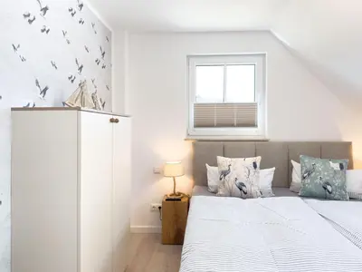 Ein Bett oder Betten in einem Zimmer der Unterkunft Störtebekerkoje 12 6