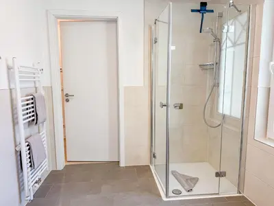 Ein Badezimmer in der Unterkunft Küstenkajüte Whg 1