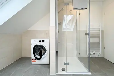 Ein Badezimmer in der Unterkunft Küstenkajüte Whg 7
