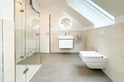 Ein Badezimmer in der Unterkunft Küstenkajüte Whg 7