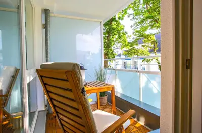 Ein Balkon oder eine Terrasse in der Unterkunft Meereswoge Zingst - 5-Sterne Erholung an der Ostseeküste