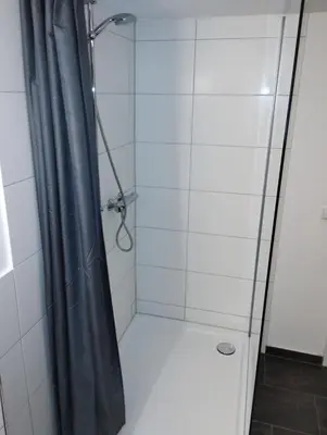 Ein Badezimmer in der Unterkunft HuusamDarß