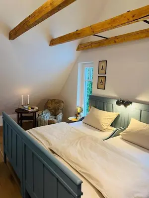 Ein Bett oder Betten in einem Zimmer der Unterkunft Ferienhaus Slichtemolen