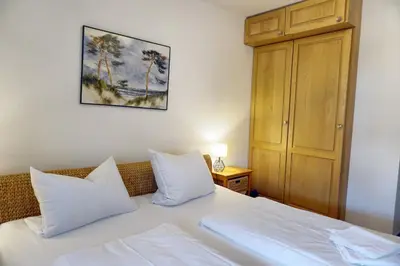 Ein Bett oder Betten in einem Zimmer der Unterkunft StrandglückHaus Sophie
