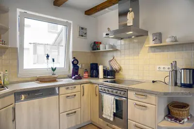 Küche/Küchenzeile in der Unterkunft StrandglückHaus Sophie