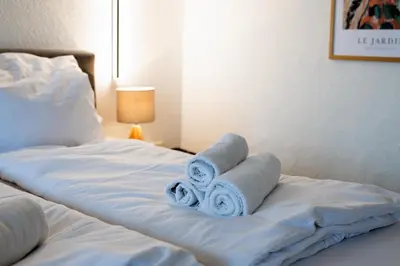 Ein Bett oder Betten in einem Zimmer der Unterkunft Pension Seeblick