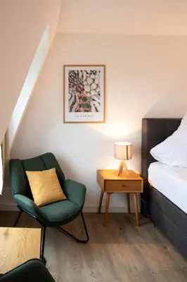 Ein Bett oder Betten in einem Zimmer der Unterkunft Pension Seeblick