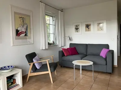 Ein Sitzbereich in der Unterkunft Ferienwohnung Störtebeker