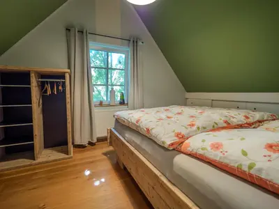 Ein Bett oder Betten in einem Zimmer der Unterkunft Ferienhaus mit 3 Schlafzimmern für 6 Personen