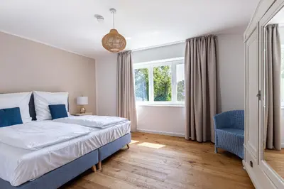 Ein Bett oder Betten in einem Zimmer der Unterkunft Eenhoorn